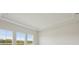 Home has a white ceiling with decorative molding at 35587 Stableton Ln, Zephyrhills, FL 33541