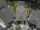 Overhead aerial view of a home showcasing the yard and roof lines and its position between neighboring houses at 858 Vino Verde Cir, Brandon, FL 33511