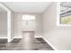 Neutral room with modern vinyl flooring and white trim at 9315 N 19Th St, Tampa, FL 33612