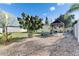 Spacious backyard featuring a hammock, shed, and plenty of room to relax at 10719 Drummond Rd, Tampa, FL 33615