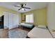 Bedroom with natural light and large closet at 10719 Drummond Rd, Tampa, FL 33615