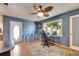 Bright office features a ceiling fan, natural light, and direct access to the front door at 10719 Drummond Rd, Tampa, FL 33615