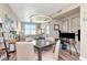 Spacious dining area with modern lighting, seamlessly connected to the living area, offering a comfortable and stylish living space at 1208 E Kennedy Blvd # 1122, Tampa, FL 33602