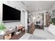 Living room and dining area with modern lighting, wood floors, and stylish decor at 1208 E Kennedy Blvd # 1122, Tampa, FL 33602