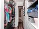 Organized walk-in closet with custom shelving and storage solutions, maximizing space and functionality at 1208 E Kennedy Blvd # 1122, Tampa, FL 33602