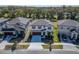 An aerial view captures this cozy home, showcasing its well-manicured lawn and peaceful neighborhood setting at 14733 Gallop Run Dr, Lithia, FL 33547