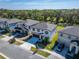 Beautiful aerial shot shows the neighborhood highlighting the manicured lawns and landscaping of this lovely home at 14733 Gallop Run Dr, Lithia, FL 33547