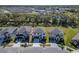 An aerial perspective showcasing community amenities, water features, and the neighborhood's cohesive design at 14733 Gallop Run Dr, Lithia, FL 33547