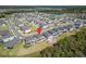 Aerial view of neighborhood homes, with a pin marking the property location at 14733 Gallop Run Dr, Lithia, FL 33547