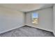 Bedroom featuring neutral colored walls and plush carpet at 14733 Gallop Run Dr, Lithia, FL 33547