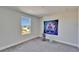 Well-lit bedroom with neutral gray carpet, a bright window, and tranquil decor at 14733 Gallop Run Dr, Lithia, FL 33547