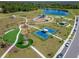 Community amenities featuring a recreation area with playground, picnic pavilions, and sports facilities at 14733 Gallop Run Dr, Lithia, FL 33547