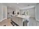 Kitchen island with stainless steel appliances, a dishwasher and a large counter at 14733 Gallop Run Dr, Lithia, FL 33547