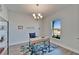 Bright office with desk, chair, shelving for storage, and a view at 14733 Gallop Run Dr, Lithia, FL 33547