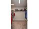 Spacious walk-in closet featuring carpeted floors and shelving for ample storage in this lovely home at 14733 Gallop Run Dr, Lithia, FL 33547