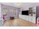Spacious bonus room featuring custom built-in shelving and a large window at 15703 Jericho Dr, Odessa, FL 33556