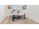 Home office with modern desk, natural light, and carpeted floor, great for remote work at 16946 Oval Rum Dr., Wimauma, FL 33598