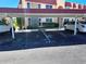 Carport parking with assigned spots in front of the condo building at 205 Dogwood Cir # 205, Seminole, FL 33777