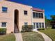 Charming two-story condo with textured walls, and beautiful landscape at 205 Dogwood Cir # 205, Seminole, FL 33777