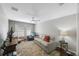 Living room featuring fan, sofa, rug, and natural light at 220 2Nd Sw Ave, Largo, FL 33770