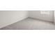 Bedroom featuring gray carpet, a window, and white walls at 24041 Peppercorn Rd, Punta Gorda, FL 33955