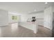 Modern kitchen with an island, stainless appliances, and sleek countertops at 24041 Peppercorn Rd, Punta Gorda, FL 33955