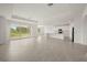 Bright and airy living space with a seamless flow to the kitchen and outdoor patio at 24041 Peppercorn Rd, Punta Gorda, FL 33955