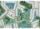 Aerial community view showcasing the neighborhood layout with ponds, amenities, and wetland preserves, all in a Primary-planned setting at 29525 Velletri Ln, Wesley Chapel, FL 33543