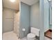 Cozy bathroom with shower, toilet, and sink at 312 Fairside Ct # 12, Sun City Center, FL 33573