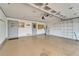 Spacious two-car garage with ample storage and work space at 312 Fairside Ct # 12, Sun City Center, FL 33573