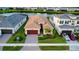 Beautiful single-story home with a well-manicured lawn and a two-car garage at 32768 Tree Of Life Ave, Wesley Chapel, FL 33543