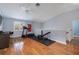 Spacious home gym with hardwood floors and exercise equipment, perfect for staying active at 4859 Augusta Ave, Oldsmar, FL 34677
