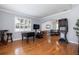 Inviting game room with foosball table, electronic dart board, and hardwood floors at 4859 Augusta Ave, Oldsmar, FL 34677