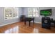 Bright game room with windows, foosball table, and golf video game at 4859 Augusta Ave, Oldsmar, FL 34677