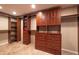 Spacious walk-in closet featuring custom wood shelving and drawers for ample storage space at 4859 Augusta Ave, Oldsmar, FL 34677