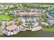 Aerial view of community clubhouse featuring pools, dining and recreational activities at 5014 Coastal Oak Ct, Lakewood Ranch, FL 34211