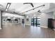A spacious yoga and dance studio with plenty of light and space for fitness activities at 5014 Coastal Oak Ct, Lakewood Ranch, FL 34211