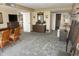 Large living space features coastal decor, comfortable seating, and plenty of natural light at 5200 Brittany Dr. S # 706, St Petersburg, FL 33715