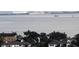 Expansive water view showcases a bridge, boats, and distant buildings, offering scenic vistas at 5200 Brittany Dr. S # 706, St Petersburg, FL 33715