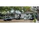 Two-story apartment building with mature trees and plenty of parking at 5221 Bayshore Blvd # 29, Tampa, FL 33611