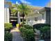 Exterior view of well-maintained building with landscaping and palm trees at 5221 Bayshore Blvd # 29, Tampa, FL 33611