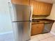 Kitchen with stainless steel refrigerator, granite countertops, and tile flooring at 5221 Bayshore Blvd # 29, Tampa, FL 33611