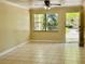 Well-lit living room with tile floors, ceiling fan, and a bright view through the window at 5221 Bayshore Blvd # 29, Tampa, FL 33611