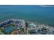 Aerial view of waterfront condos with a pool, offering beautiful scenery and coastal living experience at 5277 Isla Key S Blvd # 422, St Petersburg, FL 33715