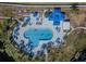 Overhead shot of the large community pool with palm trees and lounge seating in this luxurious community at 5277 Isla Key S Blvd # 422, St Petersburg, FL 33715