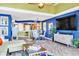 Open-concept living and dining area with modern furnishings and a view into the kitchen at 5277 Isla Key S Blvd # 422, St Petersburg, FL 33715