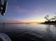 Scenic waterfront view with a vibrant sunset over the calm ocean and a glimpse of the shoreline at 5277 Isla Key S Blvd # 422, St Petersburg, FL 33715