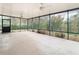 Large screened-in lanai with plenty of room for outdoor seating and entertaining at 6328 Desert Peace Ave, Land O Lakes, FL 34639
