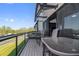 Spacious balcony with outdoor seating, offering a great view of the surrounding landscape at 6500 Motor Enclave Way # 513, Tampa, FL 33610