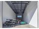 Vast garage area with open space, a high ceiling, and natural light, perfect for customization at 6500 Motor Enclave Way # 513, Tampa, FL 33610